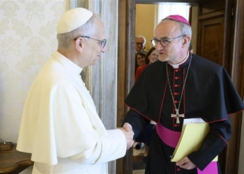 Pope Leo XIV greets Archbishop Thibault Verny of Chambéry, France, during a meeting at the Vatican June 5, 2025. The pope appointed Archbishop Verny president of the Pontifical Commission for the Protection of Minors, succeeding U.S. Cardinal Seán P. O’Malley. (CNS photo/Vatican Media)
