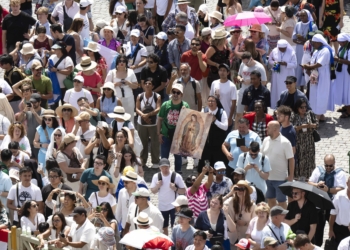 Pilgrims hold an image of Our Lady of Guadalupe as they gather in St. Peter’s Square at the Vatican for the Angelus with Pope Leo XIV July 27, 2025. (CNS photo/Vatican Media)
Pope Leo XIV leads the Angelus from the window of the Apostolic Palace overlooking St. Peter’s Square at the Vatican July 27, 2025. (CNS photo/Vatican Media)
Pope Leo XIV greets pilgrims after leading the Angelus in St. Peter’s Square at the Vatican July 27, 2025. (CNS photo/Vatican Media)