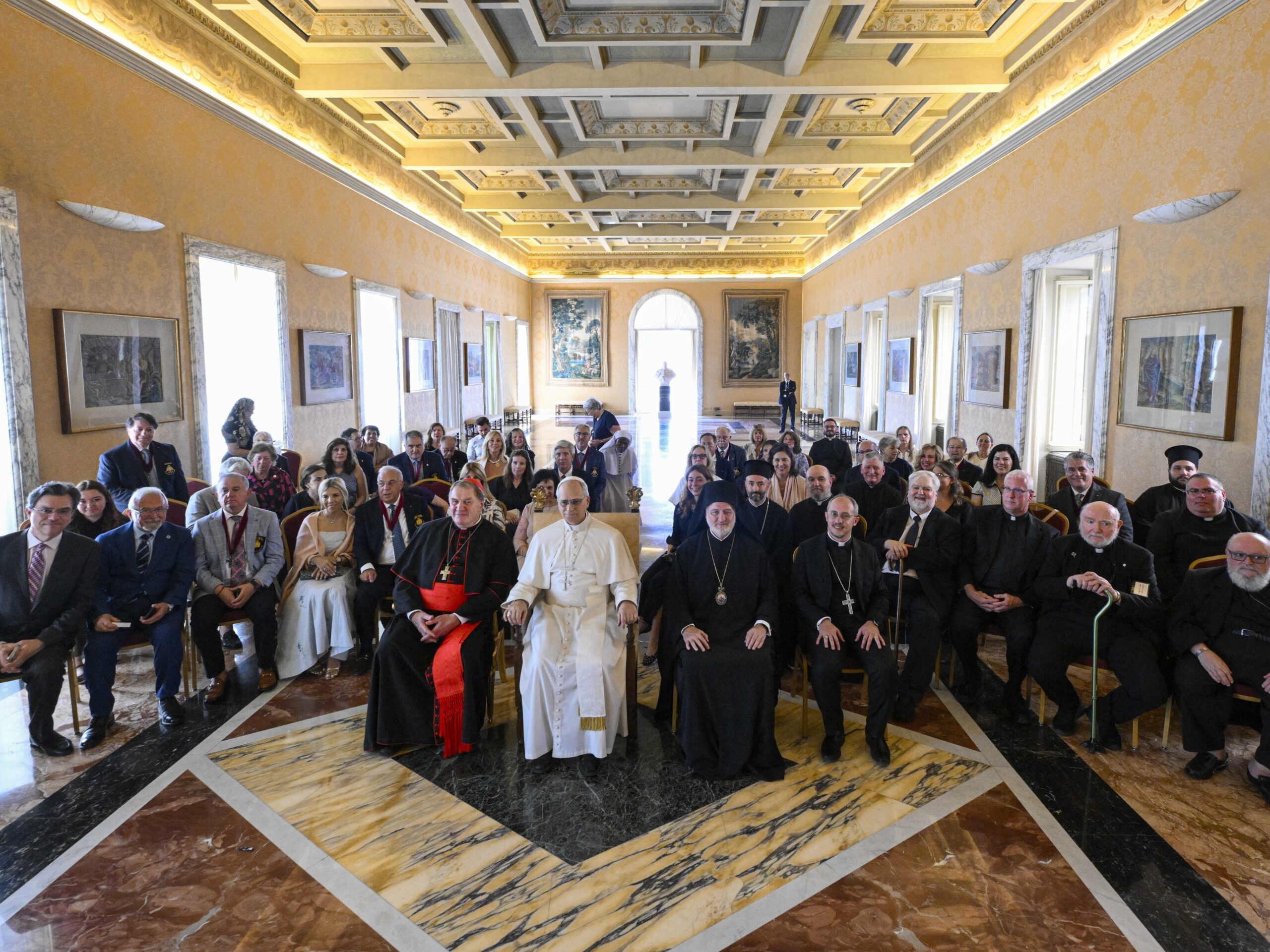 Pope Leo XIV meets with U.S. visitors at his residence at the papal villa in Castel Gandolfo, Italy, July 17, 2025. The group, led by Cardinal Joseph W. Tobin of Newark, New Jersey, and Greek Orthodox Archbishop Elpidophoros of America, was taking part in an ecumenical pilgrimage to Rome, Istanbul -- formerly known as Constantinople -- and Iznik, Turkey, site of the ancient city of Nicaea. The journey commemorates both the Holy Year dedicated to hope and the 1700th anniversary of the Council of Nicaea. (CNS photo/Vatican Media)
