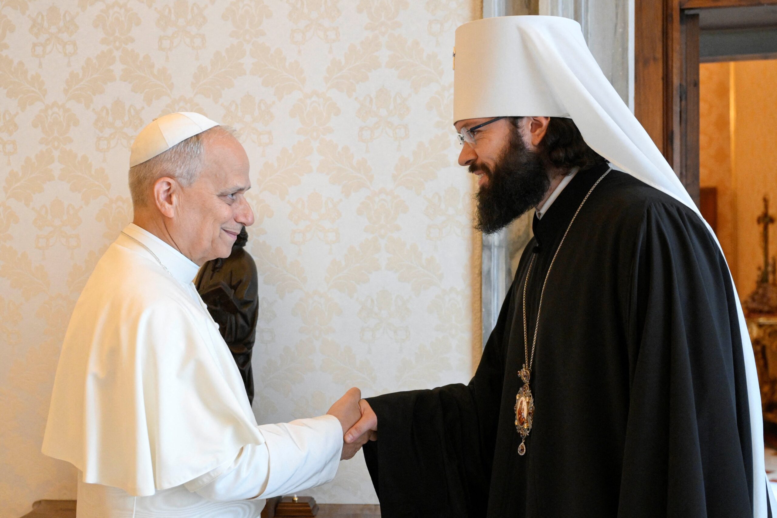 Pope Leo XIV  greets Russian Orthodox Metropolitan Anthony of Volokolamsk, head of external church relations for the Moscow Patriarchate, during a private meeting at the Vatican July 26, 2025. (OSV News photo/Simone Risoluti, Vatican Media via Reuters)