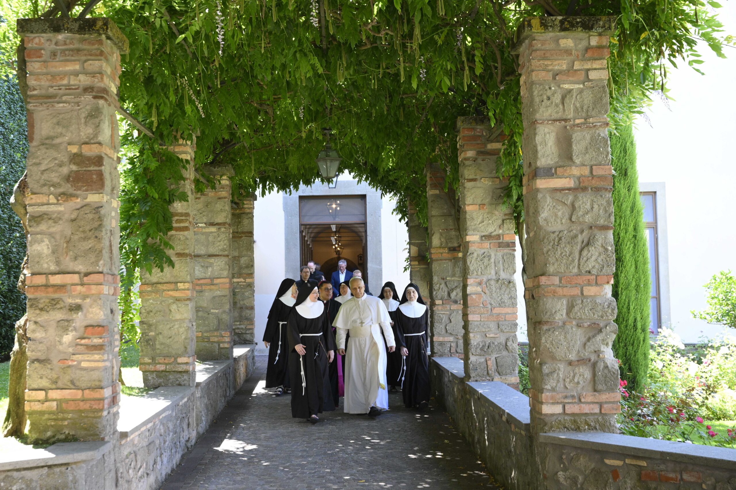 Pope Leo XIV visited members of the Italian Carabinieri in Castel Gandolfo and the Poor Clares in nearby Albano Laziale.
the local headquarters of the Carabinieri, a branch of the Italian military specialized in police work, to celebrate Mass in their chapel.
 a tree-planting ceremony with top officers. Pope Leo helped sprinkle some soil and water on a small cypress tree that had been propagated using small pieces of plant tissue taken from the 830-year-old "Cypress of St. Francis," the oldest cypress tree in Italy.
 the Monastery of the Poor Clares in Albano Laziale, which was founded in 1631 and borders part of the papal villas. 

(CNS photo/Vatican Media)