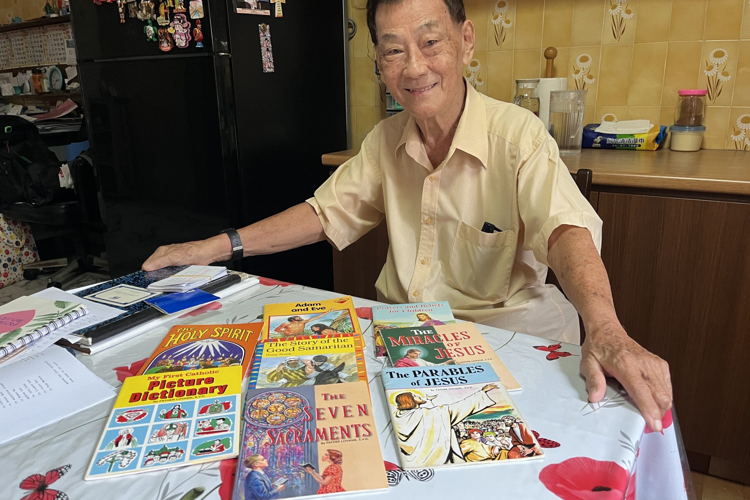 Andrew Goh, an 88-year-old catechist poses for a photo at his home in Singapore July 2, 2025. Goh uses children’s books to teach catechism to the elderly. (OSV News photo/Christopher Khoo)