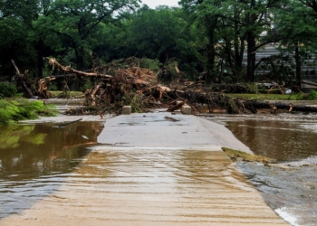 A walkway is blocked by fallen trees following deadly flooding in Kerrville, Texas, on July 5, 2025. (OSV News photo/Sergio Flores, via Reuters)