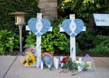 A memorial honoring shooting victims sits outside the Annunciation Church, which is a home to an elementary school and was the scene of a shooting the day before, in Minneapolis, Minn., August 28, 2025.  (OSV News photo/Tim Evans, Reuters)