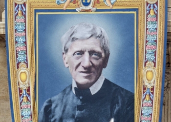 A banner of Blessed John Henry Newman hangs on the facade of St. Peter's Basilica at the Vatican Oct. 10, 2019, ahead of his Oct. 13 canonization. St. John Henry Newman was a British scholar, philosopher, writer and an Anglican priest before he was received into the Catholic Church. The Vatican announced July 31, 2025, that Pope Leo XIV has paved the way for St. John Henry Newman to become the newest doctor of the church. (CNS photo/Junno Arocho Esteves)