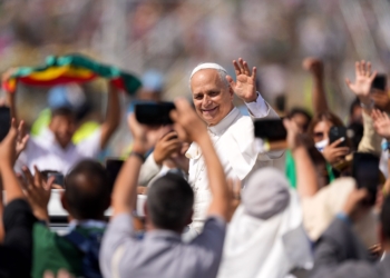 Pope Leo XIV waves to the crowd from the popemobile as he departs after celebrating a Mass concluding the Jubilee of Youth in Rome’s Tor Vergata neighborhood Aug. 3, 2025. (CNS photo/Lola Gomez)