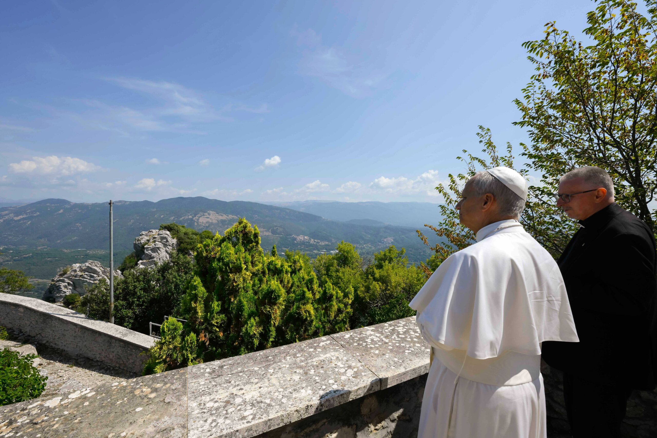 Pope Leo XIV looks out over the Prenestine Mountains from the Shrine of Our Lady of Grace in Mentorella, Italy, Aug. 19, 2025. (CNS photo/Vatican Media)