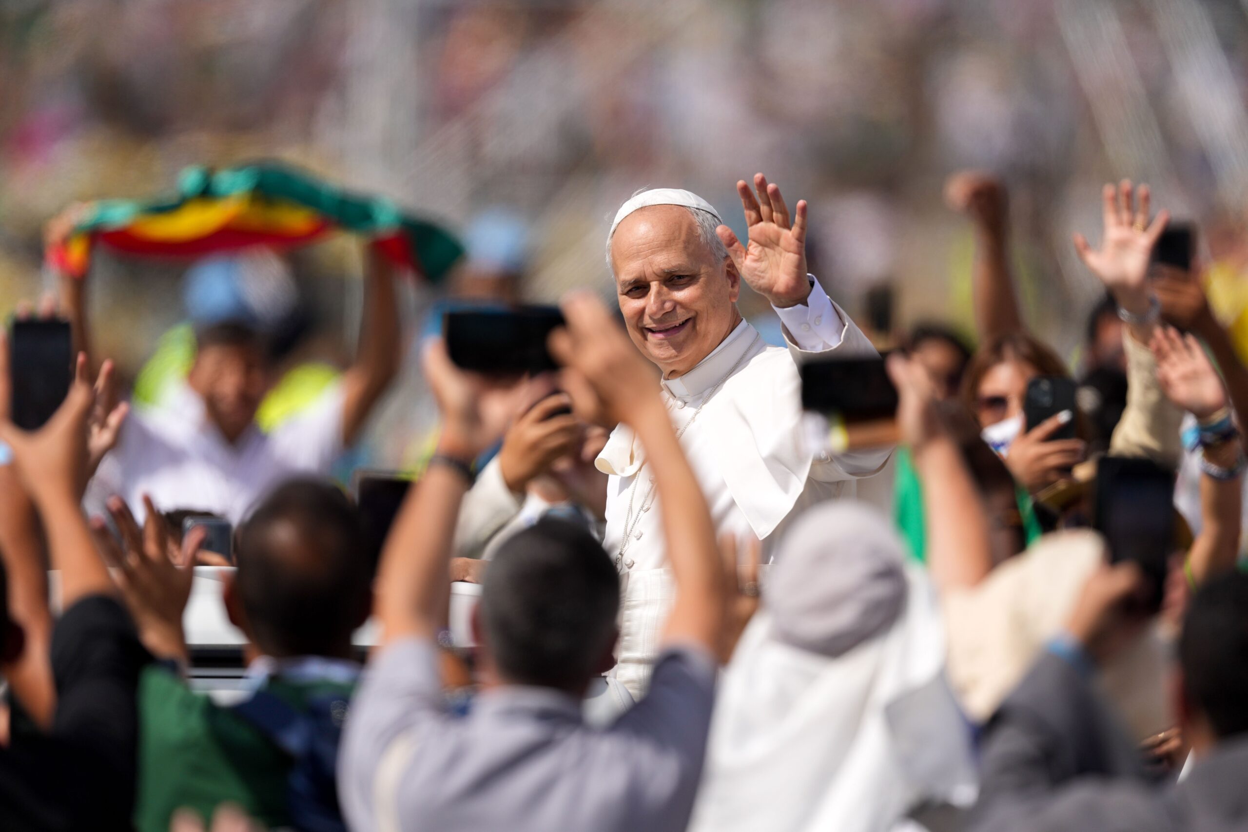 Pope Leo XIV waves to the crowd from the popemobile as he departs after celebrating the Mass closing the Jubilee of Youth in Rome’s Tor Vergata neighborhood Aug. 3, 2025. (CNS photo/Lola Gomez)