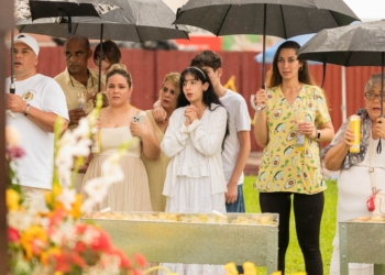Pilgrims bravedheavy rain downpours to place flowers and pray Sept 8, 2025, at the The National Shrine of Our Lady of Charity in Miami, affectionately known as La Ermita de La Caridad, for the annual feast of Our Lady of Charity and the  25th anniversary of La Ermita’s designation as a National Shrine by the United States Conference of Catholic Bishops in 2000. (OSV News photo/Tom Tracy)