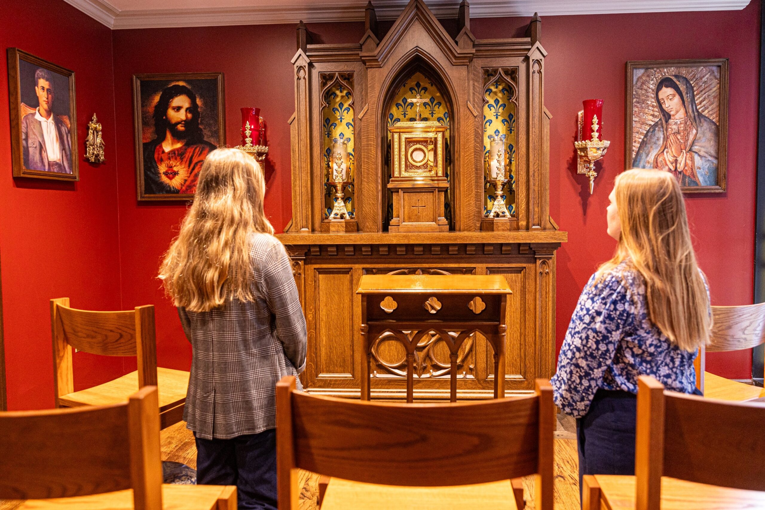 Two women pray at the new St. Pier Giorgio Frassati Chapel located next to the office of Immaculate Conception Parish in Washington Aug. 22, 2025. The new chapel is named for the new saint who was canonized by Pope Leo XIV on Sept. 7, 2025. St. Pier Giorgio, an Italian young adult who died in 1925, was known for his devotion to the Eucharist and service to those in need. The St. Pier Giorgio Frassati Chapel is open many hours every day for private prayer and is open for select hours of Eucharistic Exposition during the week. (OSV News photo/Mihoko Owada, Catholic Standard)