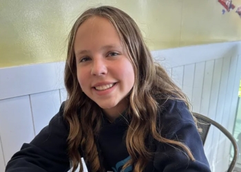 This is a screenshot from the GoFundMe page of 12-year-old Sophia Forchas, left in critical condition with head injuries when bullets tore through Annunciation’s church in Minneapolis Aug. 27, 2025. Blessing her forehead and both hands with holy water from Lourdes, France, as she lay unconscious in a hospital bed in Minneapolis, Auxiliary Bishop Michael J. Izen of St. Paul and Minneapolis, prayed for her. (OSV News photo/Sophia Forchas, GoFundMe)