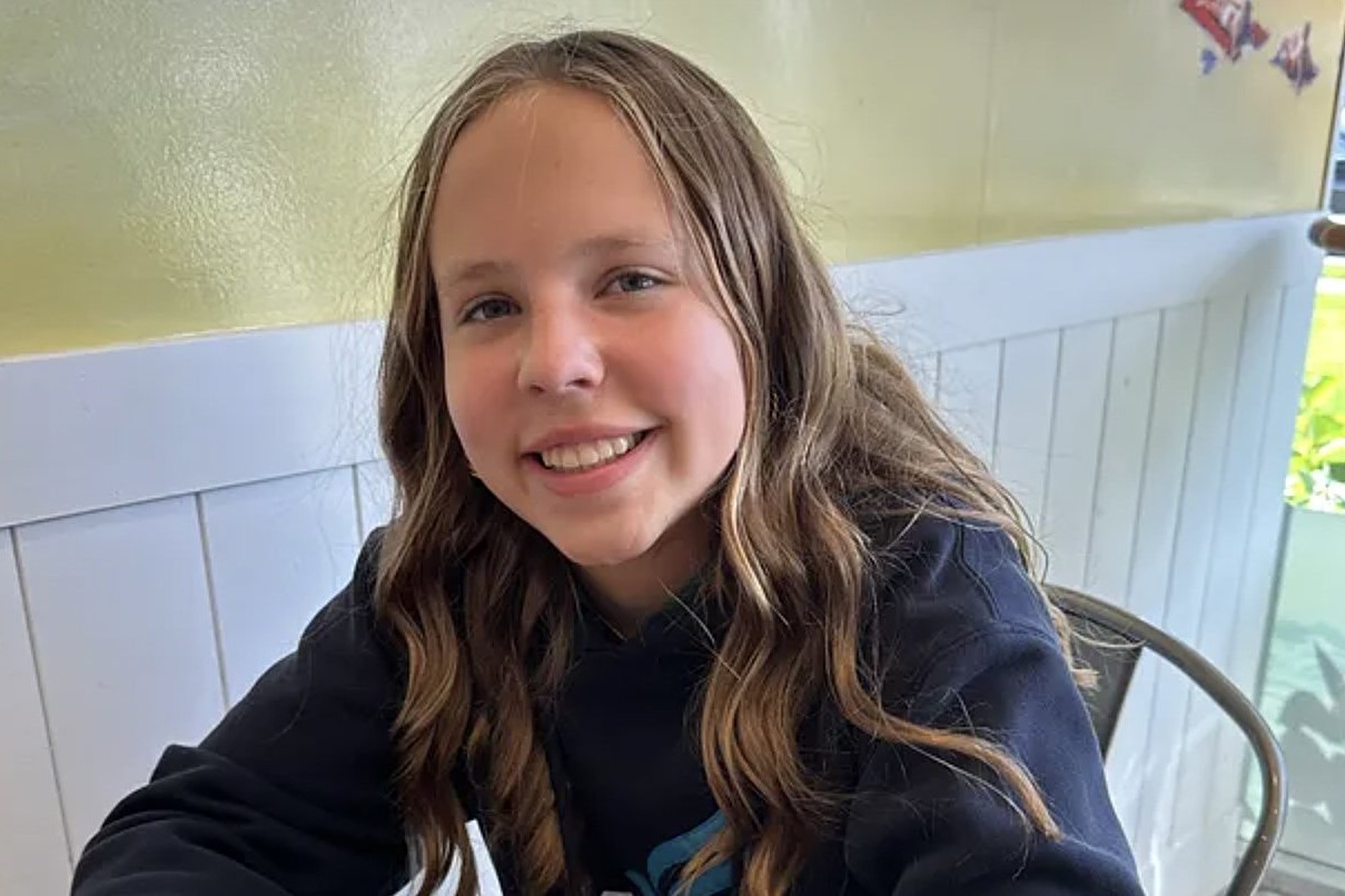 This is a screenshot from the GoFundMe page of 12-year-old Sophia Forchas, left in critical condition with head injuries when bullets tore through Annunciation’s church in Minneapolis Aug. 27, 2025. Blessing her forehead and both hands with holy water from Lourdes, France, as she lay unconscious in a hospital bed in Minneapolis, Auxiliary Bishop Michael J. Izen of St. Paul and Minneapolis, prayed for her. (OSV News photo/Sophia Forchas, GoFundMe)
