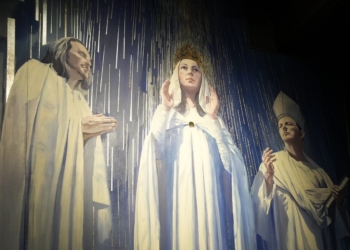 St. Joseph, Our Lady of Knock and St. John the Evangelist are depicted in a section of a 25-foot-high, four-panel mural as seen in the narthex of St. Patrick's Cathedral in New York City Sept. 18, 2025, the date of the artwork's formal unveiling. The mural depicts the 1879 Marian apparition in Knock, Ireland; people connected to the Catholic heritage and immigration history of New York City and State; and first responders who serve the metropolitan area. (OSV News photo/Gregory A. Shemitz)