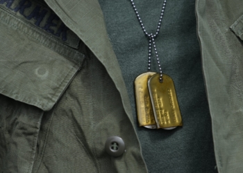 Vietnam War veteran Bob Farmer wears his U.S. Army jacket and dog tags while attending ceremonies celebrated in observance of National Vietnam War Veterans Day March 29, 2025, at Armed Forces Plaza in Hauppauge, N.Y. The event also marked the 50th anniversary of the end of the Vietnam War, which formally concluded on April 30, 1975, more than two years after the last U.S. troops departed South Vietnam on March 29, 1973. (OSV News photo/Gregory A. Shemitz)