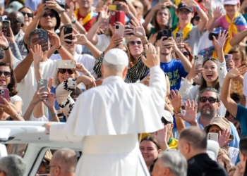 Pope Leo XIV greets visitors and pilgrims from the popemobile as he rides around St. Peter's Square at the Vatican before his weekly general audience Sept. 3, 2025. (CNS photo/Lola Gomez)