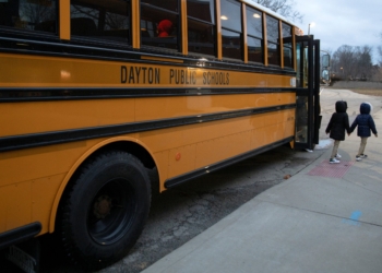 A file photo shows a public school bus droping students off  at Westwood Elementary School in Dayton, Ohio. The Religious Liberty Commission held its third hearing Sept. 29, 2025, to discuss religious liberty issues in education from the perspectives of teachers and coaches, as well as school choice issues. (OSV News photo/Megan Jelinger, Reuters)