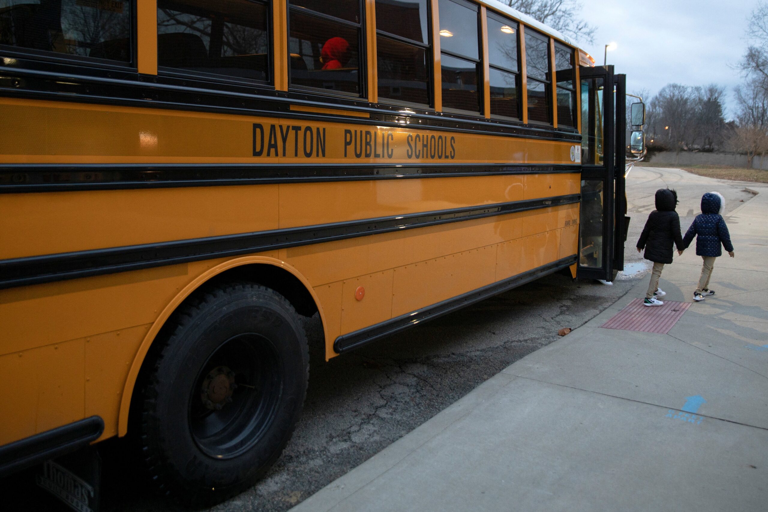 A file photo shows a public school bus droping students off  at Westwood Elementary School in Dayton, Ohio. The Religious Liberty Commission held its third hearing Sept. 29, 2025, to discuss religious liberty issues in education from the perspectives of teachers and coaches, as well as school choice issues. (OSV News photo/Megan Jelinger, Reuters)