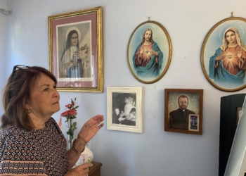 Ann O’Neill shares with a visitor the meaning of religious images that fill her home. It’s been half a century since Mother Elizabeth Ann Seton was declared a saint Sept. 14, 1975, but O’Neill's miraculous healing helped lead to the first U.S.-born saint’s canonization doesn’t dwell on the miracle that saved her life when she was a toddler. (OSV News photo/courtesy Connie Connolly, The Dialog)
