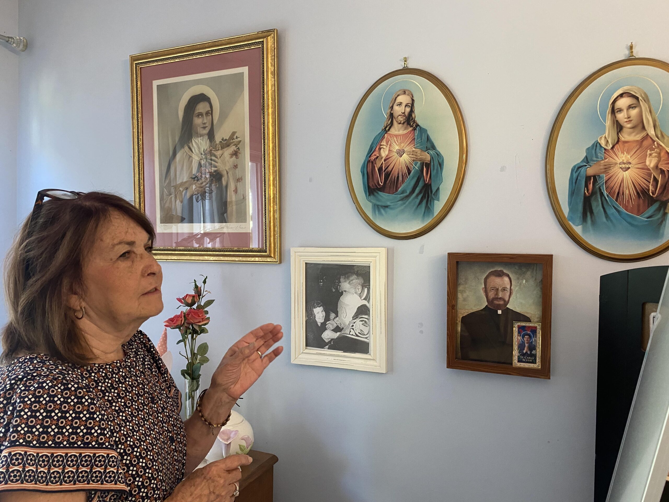Ann O’Neill shares with a visitor the meaning of religious images that fill her home. It’s been half a century since Mother Elizabeth Ann Seton was declared a saint Sept. 14, 1975, but O’Neill's miraculous healing helped lead to the first U.S.-born saint’s canonization doesn’t dwell on the miracle that saved her life when she was a toddler. (OSV News photo/courtesy Connie Connolly, The Dialog)