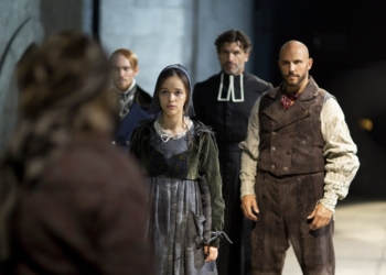 Eyma Scharen, who plays St. Bernadette, and other cast members appear on stage in the musical "Bernadette of Lourdes." (OSV News photo/Fathom Productions)