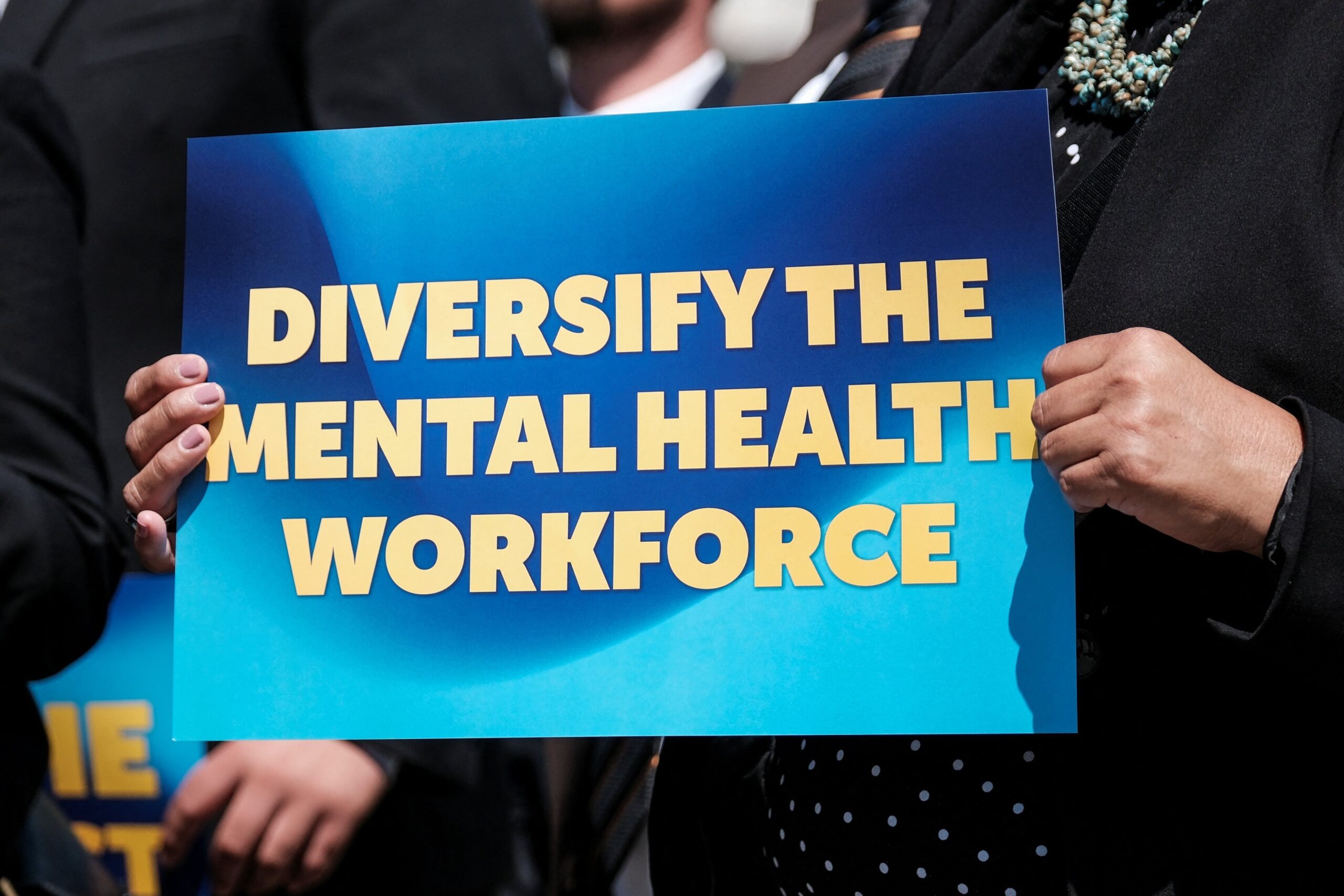A mental health advocate holds a sign during a press conference on the proposed Mental Health Workforce Act April 10, 2024, on Capitol Hill in Washington. In recognition of the continuing mental health crisis in our nation, the U.S. Conference of Catholic Bishops announced a new component of its National Catholic Mental Health Campaign in September 2025, “Healing and Hope." (OSV News photo//Michael A. McCoy, Reuters)
