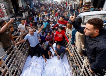 Mourners gather for the funeral of members of the Abu Dalal family in Nuseirat, central Gaza Strip, Oct. 29, 2025, who were killed in an overnight Israeli strike on their home, according to medics. (OSV News photo/Mahmoud Issa, Reuters)