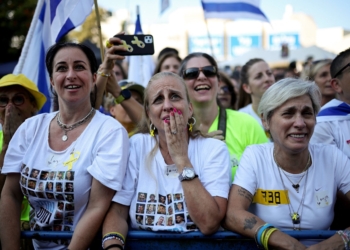 Women react as people gather at "Hostages Square" in Tel Aviv, Israel, Oct. 3, 2025, on the day Hamas releases hostages, who have been held in Gaza since the deadly Oct. 7, 2023, attack by Hamas, as part of a prisoner-hostage swap and a ceasefire deal between Israel and Hamas. (OSV News photo/Shir Torem, Reuters)