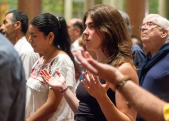 People pray during a Mass marking the 111th World Day of Migrants and Refugees on Sept. 28, 2025 at the Cathedral of St. Matthew the Apostle in Washington. (OSV News photo/Mihoko Owada, Catholic Standard)