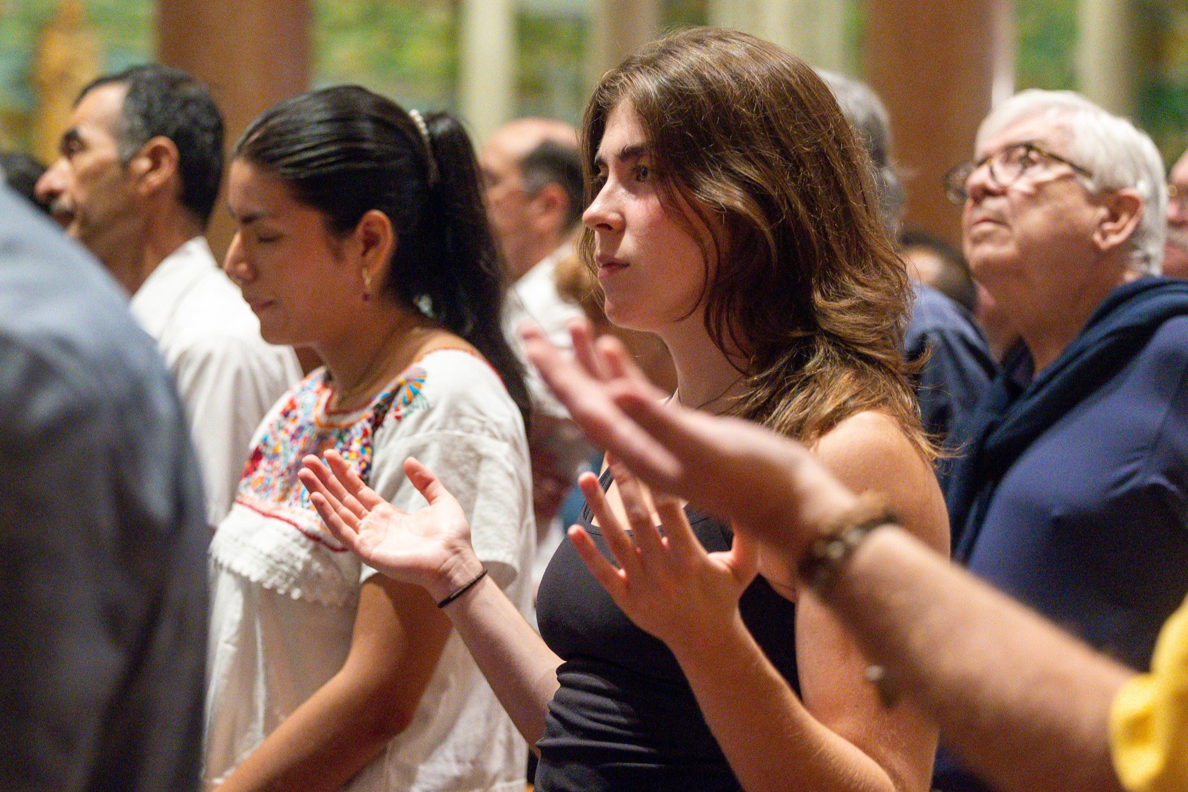 People pray during a Mass marking the 111th World Day of Migrants and Refugees on Sept. 28, 2025 at the Cathedral of St. Matthew the Apostle in Washington. (OSV News photo/Mihoko Owada, Catholic Standard)