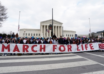 Students from Wheaton College in Wheaton, Illinois, hold the March for Life banner outside the U.S. Supreme Court during the annual March for Life in Washington Jan. 24, 2025. (OSV News photo/Elizabeth Frantz, Reuters)