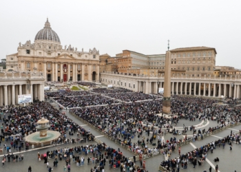 A file photo shows people gathering in St. Peters Square. When Pope Leo XIV raises three women and four men to the altar Oct. 19, 2025, he will canonize a diverse group of religious and lay men and women, all bound by the virtue of holding on to their faith amid personal, spiritual, and external challenges.  (CNS photo/Lola Gomez)