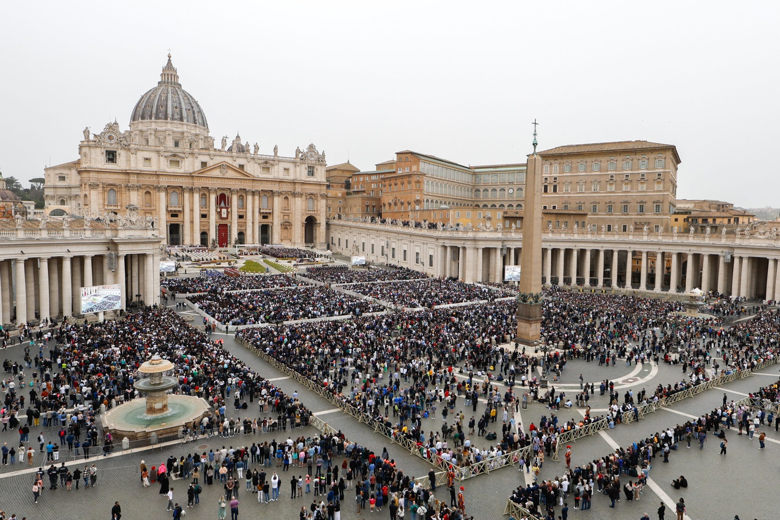 A file photo shows people gathering in St. Peters Square. When Pope Leo XIV raises three women and four men to the altar Oct. 19, 2025, he will canonize a diverse group of religious and lay men and women, all bound by the virtue of holding on to their faith amid personal, spiritual, and external challenges.  (CNS photo/Lola Gomez)