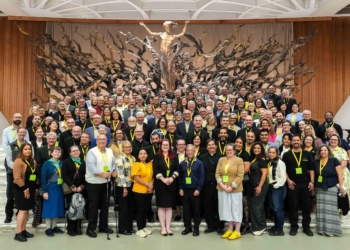 Many of the U.S. bishops and pilgrims attending the Jubilee of Synodal Teams and Participatory Bodies pose for a group photo Oct. 25, 2025, in the Paul VI Audience Hall at the Vatican. (CNS photo/Lola Gomez)