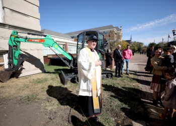 Bishop Louis Tylka of Peoria, Ill., leads a groundbreaking ceremony outside the Spalding Institute to convert Ven. Fulton J. Sheen’s alma mater into a cultural center. (OSV News photo/courtesy of Nellie Photography)