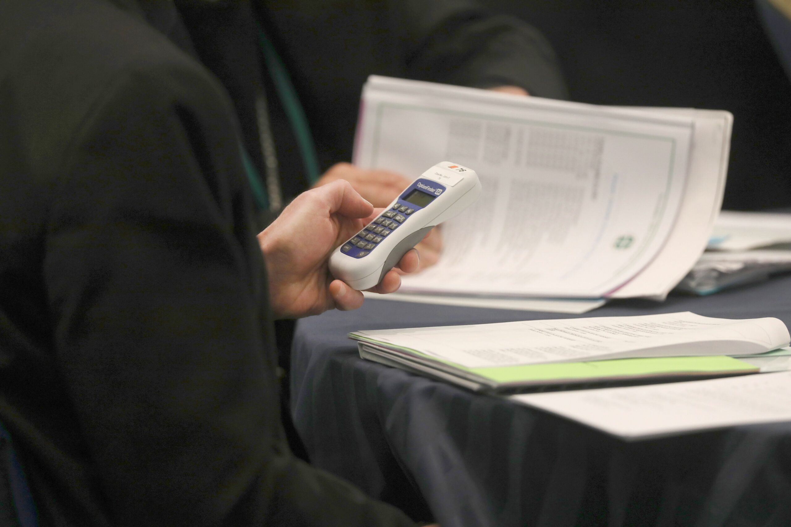 A bishop uses an electronic voting device during a Nov. 14, 2023, session of the fall general assembly of the U.S. Conference of Catholic Bishops in Baltimore. (OSV News photo/Bob Roller)
