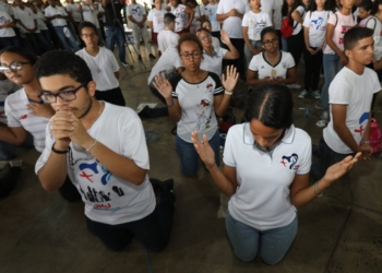 Youths pray during a vigil for young people at the Church of Christ the Redeemer April 22, 2018, outside Panama City. (OSV News photo/Bob Roller)