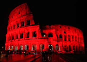 In this photo from Feb. 24, 2018, the Colosseum in Rome is lit up in red to draw attention to the persecution of Christians around the world. The pontifical foundation Aid to the Church in Need provides spiritual and material assistance to Catholics and other Christians facing religious persecution, economic hardship and other difficulties. (OSV News photo/Remo Casilli, Reuters)
