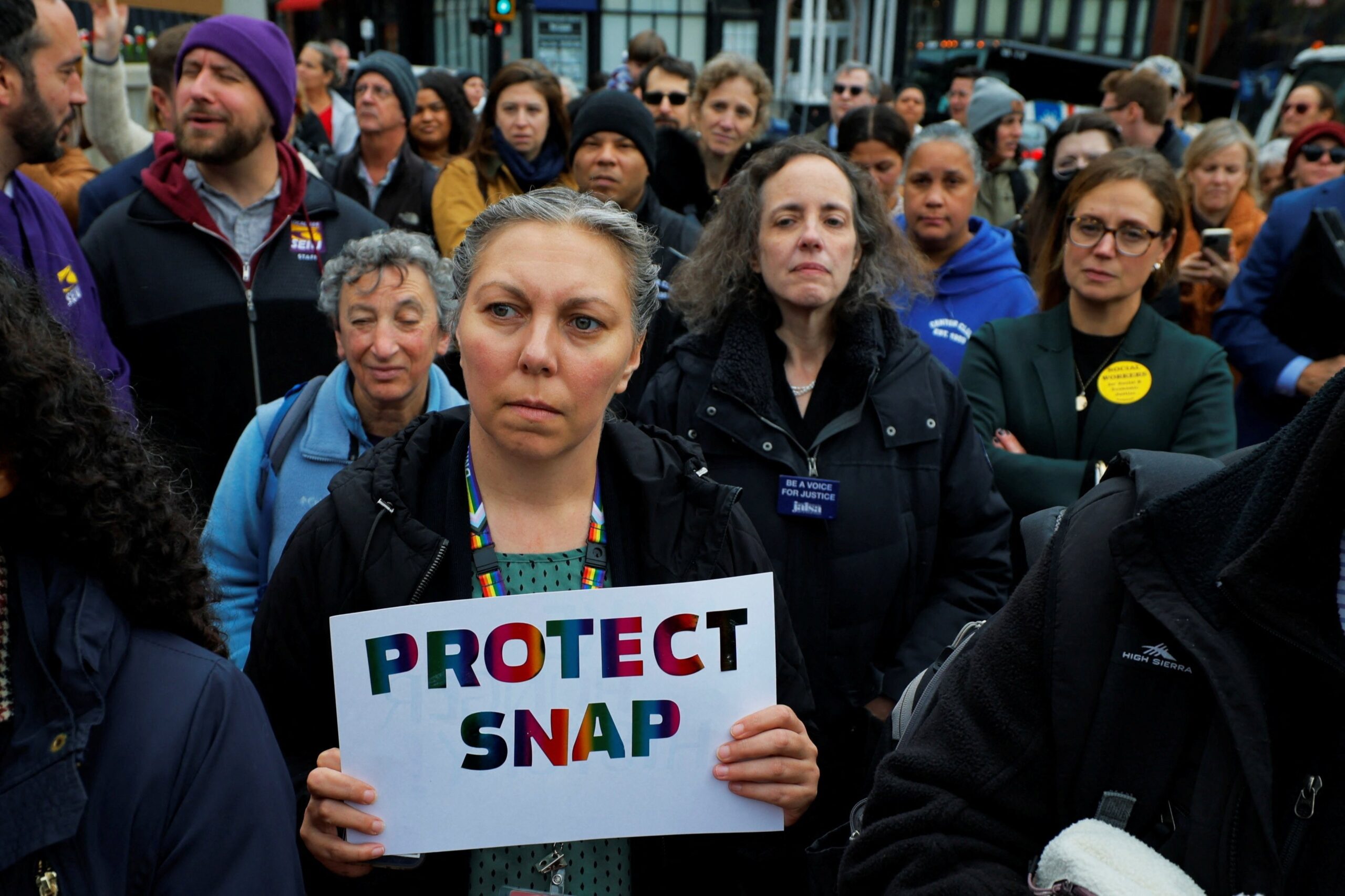 A woman holds a sign during "A Rally for SNAP" on the steps of the Massachusetts Statehouse in Boston Oct. 28, 2025, as it is anticipated food aid benefits will be suspended starting Nov. 1 amid the ongoing U.S. government shutdown. (OSV News photo/Brian Snyder, Reuters)