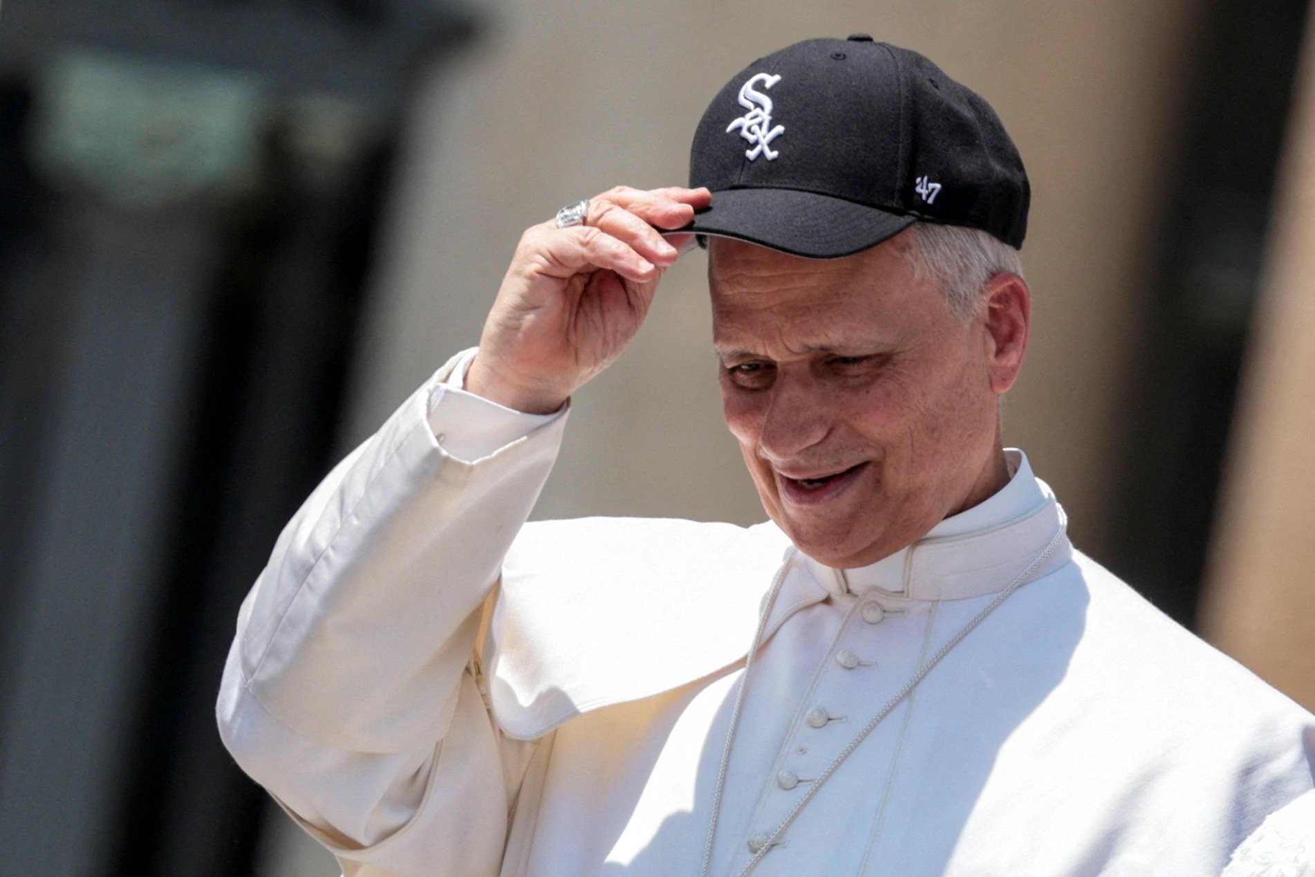 Pope Leo XIV wears a Chicago White Sox baseball cap during his weekly general audience in St. Peter's Square at the Vatican June 11, 2025. (OSV News photo/Remo Casilli, Reuters)