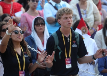 Young people pray near a monstrance after a Mass for the feast of Corpus Christi at the Cathedral of Our Lady of the Angels in Los Angeles June 22, 2025, during the National Eucharistic Pilgrimage. In a statement Oct. 15, 2025, Bishop Earl A. Boyea of Lansing, Mich., encouraged prayer and a renewed commitment to journey with young people in their vocations during National Vocation Awareness Week Nov. 2-8. Bishop Boyea is chair of the U.S. bishops' Committee on Clergy, Consecrated Life and Vocations. (OSV News photo/Bob Roller)