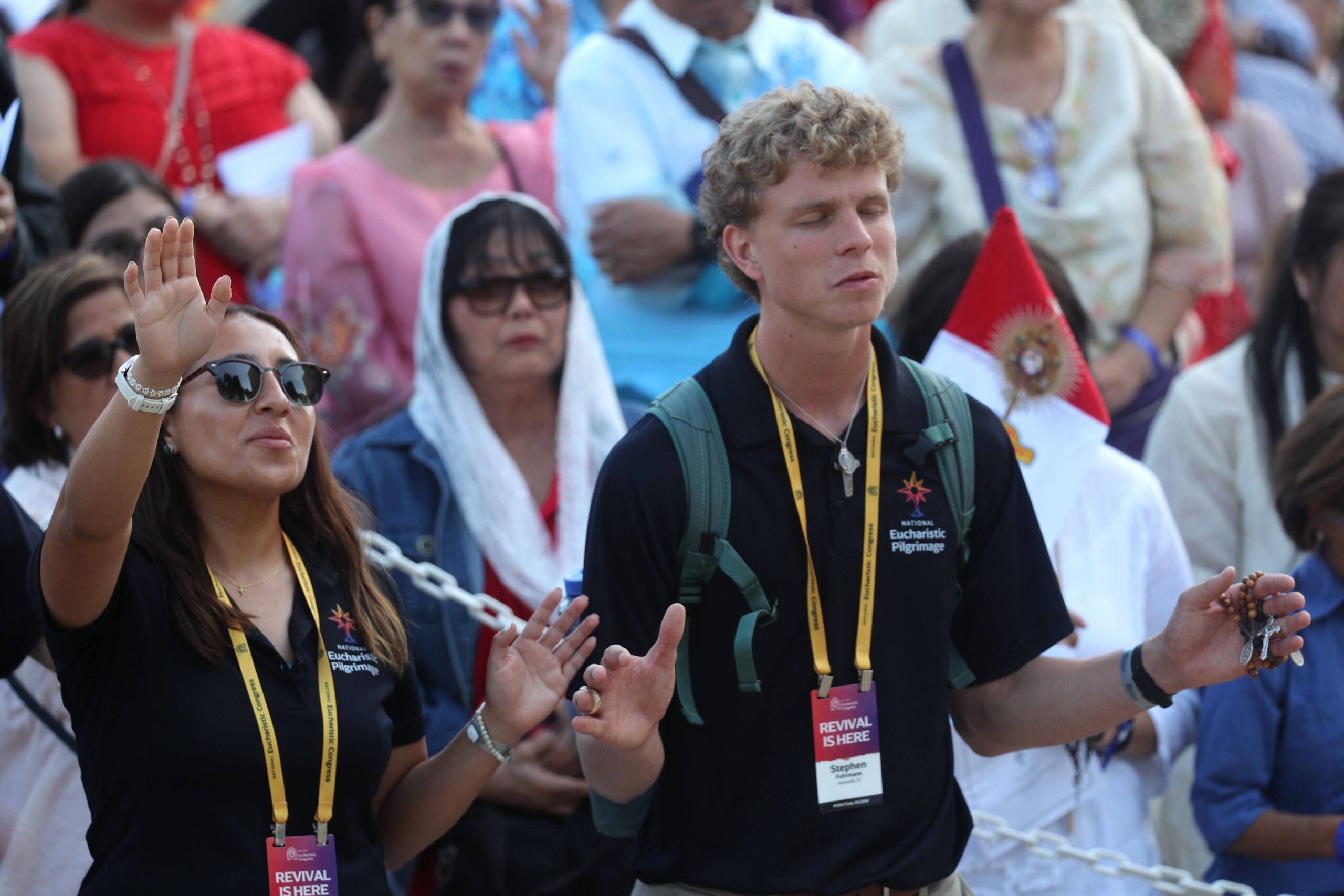 Young people pray near a monstrance after a Mass for the feast of Corpus Christi at the Cathedral of Our Lady of the Angels in Los Angeles June 22, 2025, during the National Eucharistic Pilgrimage. In a statement Oct. 15, 2025, Bishop Earl A. Boyea of Lansing, Mich., encouraged prayer and a renewed commitment to journey with young people in their vocations during National Vocation Awareness Week Nov. 2-8. Bishop Boyea is chair of the U.S. bishops' Committee on Clergy, Consecrated Life and Vocations. (OSV News photo/Bob Roller)