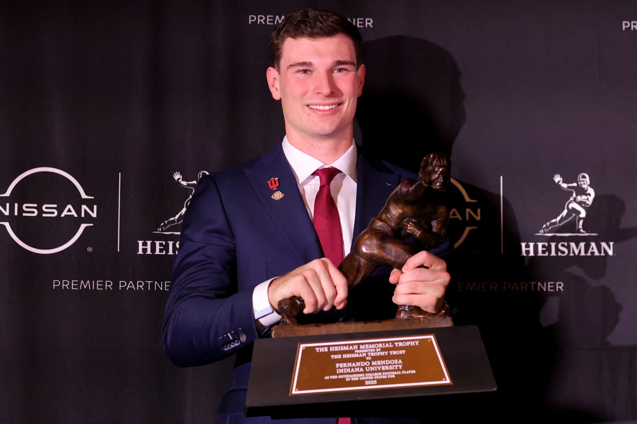 Fernando Mendoza, quarterback for the Indiana Hoosiers, becomes emotional after winning the Heisman Trophy at Lincoln Center in New York City Dec. 13, 2025. Mendoza, a Catholic, frequently crediting his faith in God and Jesus Christ for his success, incorporating daily Mass and Bible studies into his routine, and giving glory to God in post-game interviews and his Heisman acceptance speech. Mandatory Credit: (OSV News photo/Todd Van Emst, Heisman Trust, Pool via USA TODAY Sports, Reuters)