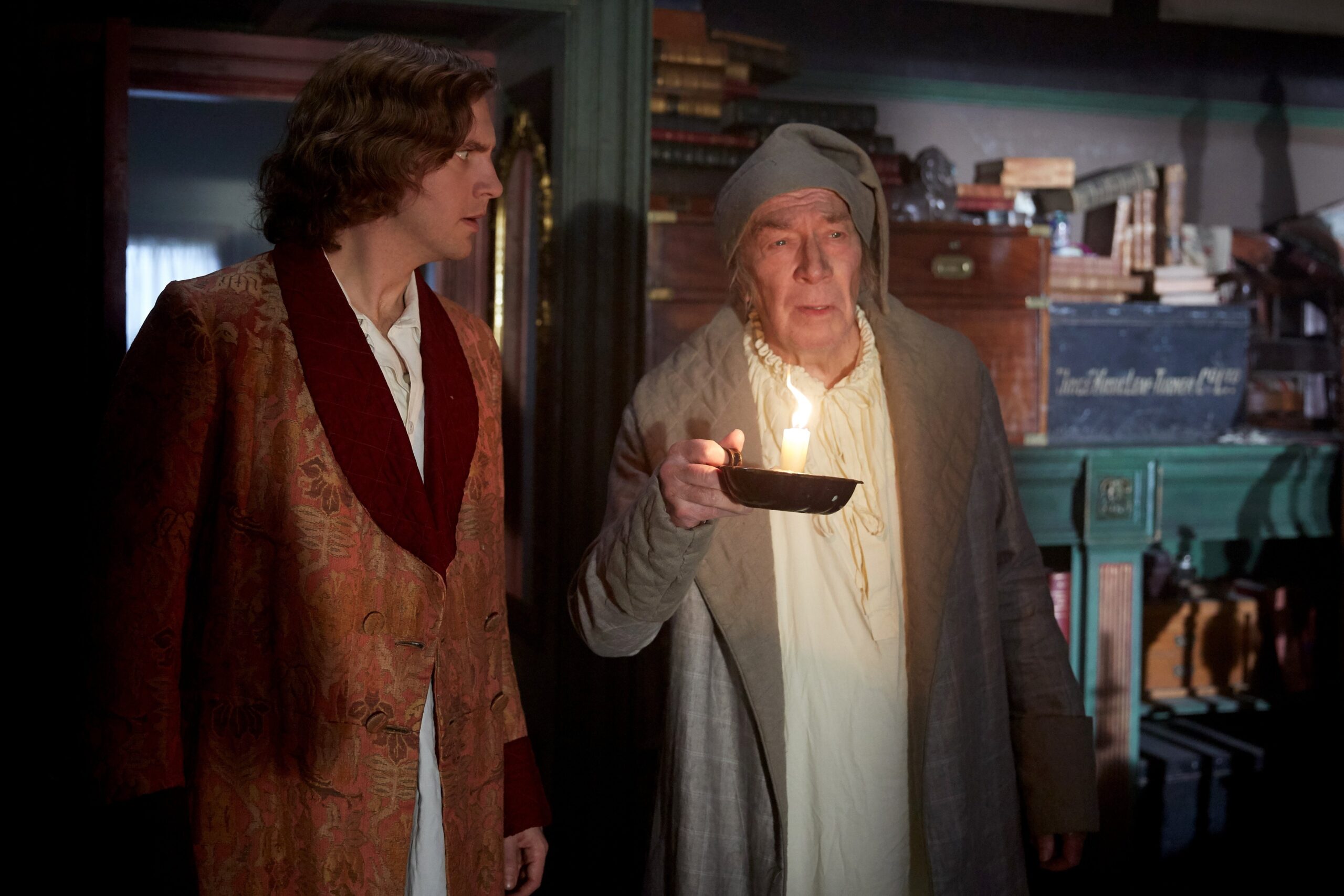 Dan Stevens and Christopher Plummer star in a scene from the movie "The Man Who Invented Christmas." The OSV News classification is A-II -- adults and adolescents. The Motion Picture Association of America rating is PG -- parental guidance suggested. Some material may not be suitable for children. (OSV News photo/Kerry Brown, Bleecker Street)
