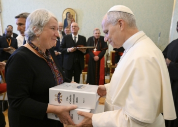 Pope Leo XIV receives a preview copy of The Catholic American Bible, slated for publication in 2027, from Mary Sperry, associate director of the U.S. bishops’ Office for the Biblical Apostolate, during an audience with members of the Catholic Biblical Federation at the Vatican Nov. 17, 2025. (CNS photo/Vatican Media)