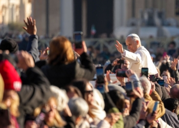 Pope Leo XIV greets visitors and pilgrims from the popemobile as he rides around St. Peter's Square at the Vatican before his weekly general audience Dec. 10, 2025. (CNS photo/Lola Gomez)