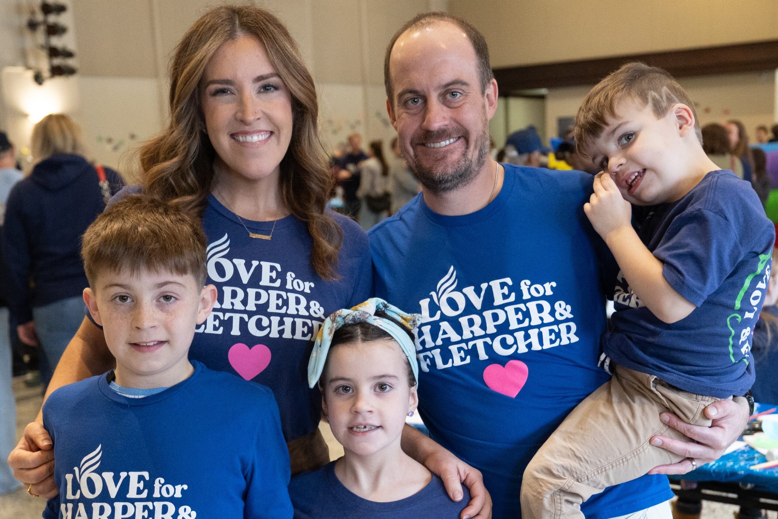 Mollie and Jesse Merkel, pose with their children Rory, Hazel and Milo, at Annunciation Catholic School in Minneapolis Jan. 10, 2026, for FletcherFest in honor of their son Fletcher, who died in an Aug. 27, 2025, shooting during an all-school Mass at Annunciation’s church in south Minneapolis. The event featured food, games and socializing as people celebrated Fletcher’s life. (OSV News photo/Dave Hrbacek, The Catholic Spirit)