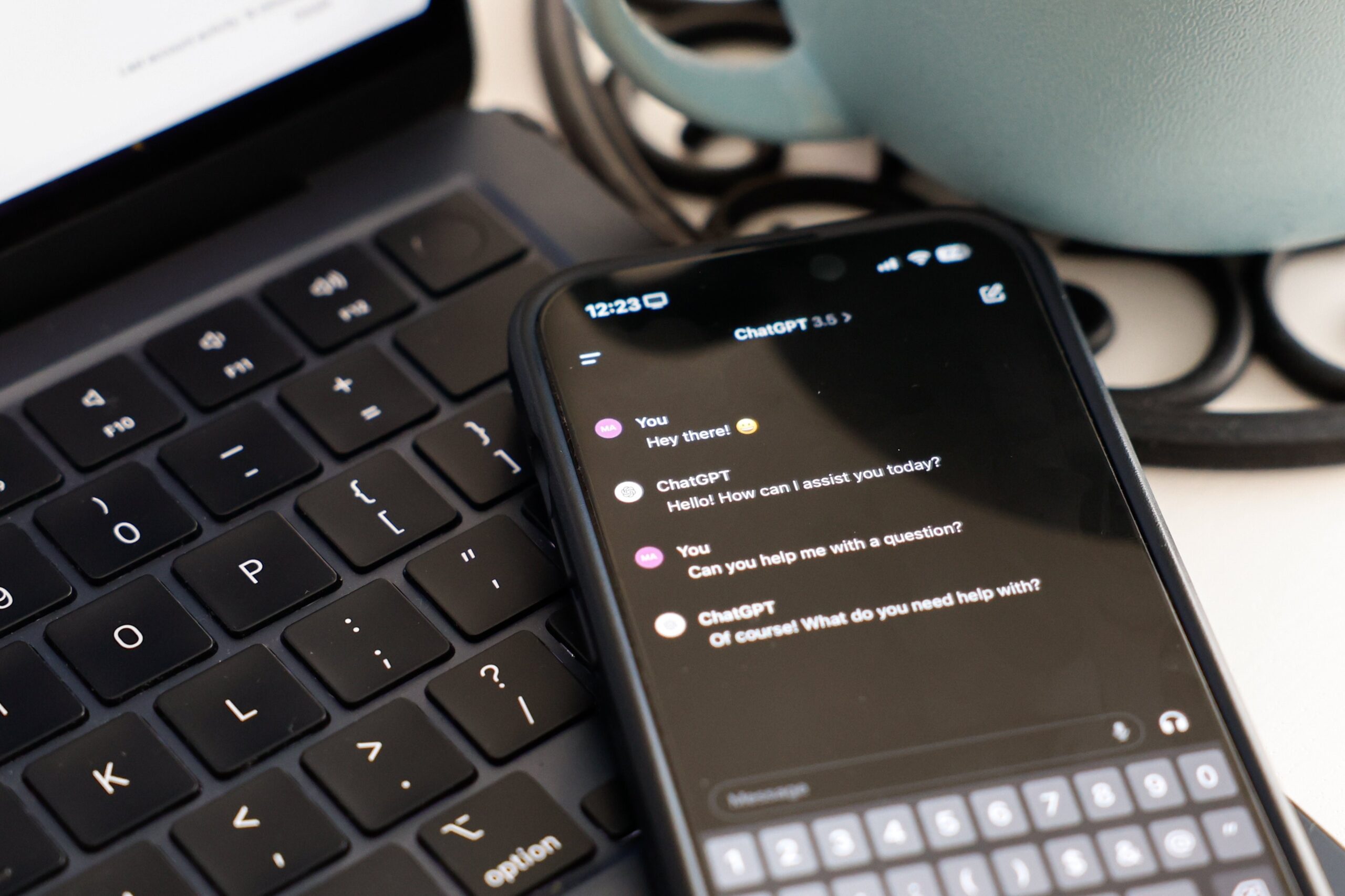 The ChatGPT app is seen on a phone placed atop a keyboard in this photo taken in Rome March 8, 2024. (CNS photo/Lola Gomez)