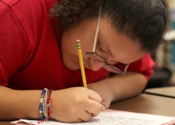 Fourth-grader Maria Rios works on a paper during class at Sacred Heart Grade School in Prescott, Ariz., Jan. 20, 2026. Catholic Schools Week, the annual celebration of Catholic education in the U.S., is observed Jan. 25-31 in 2026. (OSV News photo/Bob Roller)