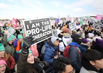 People hold up signs during the 52nd annual March for Life rally in Washington Jan. 24, 2025. (OSV News photo/Bob Roller). (OSV News photo/Bob Roller)