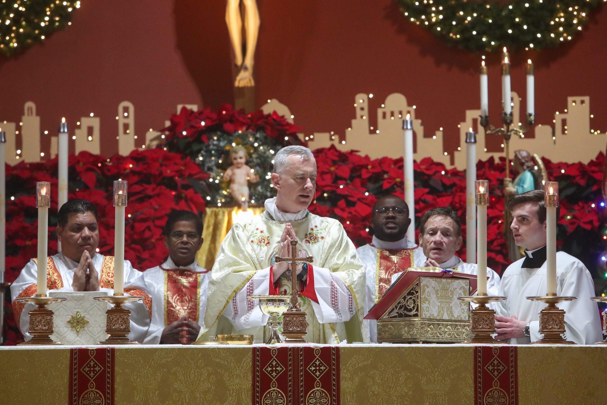 Bishop Joseph Williams and Father Anthony J. Manuppella celebrate Midnight Mass at Saint Gianna Beretta Molla Parish in Northfield, Thursday, Dec. 25, 2025.